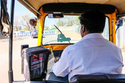 Tourists Enjoying a Ride in Tuk-Tuk