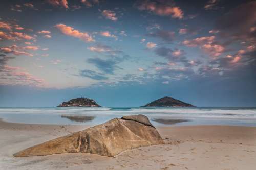 A Stoney Mound On The Beach Photo