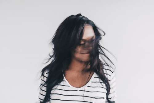 A Woman Tosses Her Hair Photo