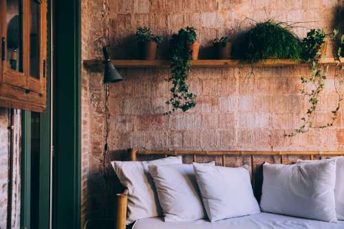 Couch By Interior Brick Wall Photo
