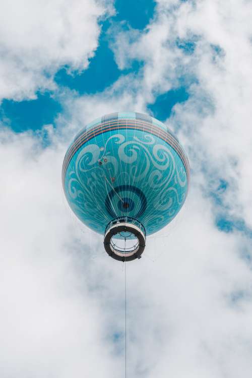 Looking Skyward to A Whimsical Blue Hot Air Balloon Photo