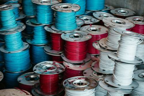 Spools Of Red, White And Blue Wire Photo