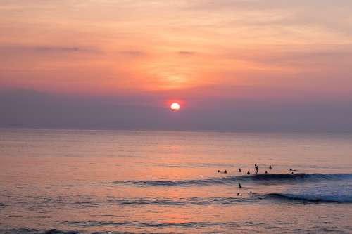 Sunset Surfing Photo