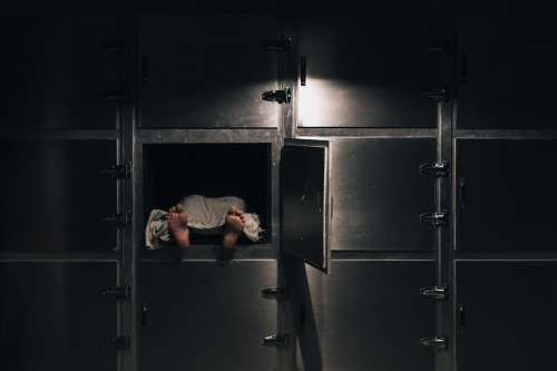 Uncovered Body In A Morgue Freezer Photo