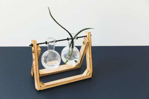 Vase Made From Round Bottom Flasks On Wooden Frame Photo