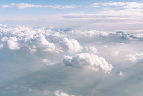 clouds flying high flight air travel airline