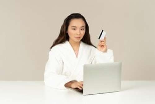 Young Asian Woman Doing Online Shopping