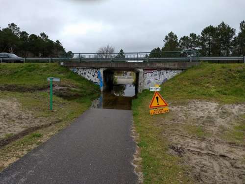 Flooded underpass cycle route bridge cycle path