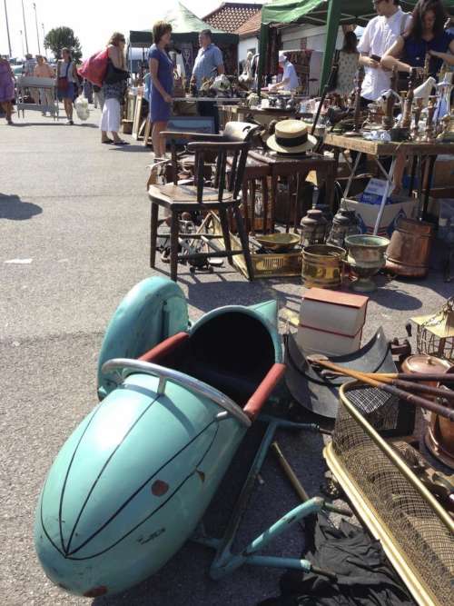 antiques fair sidecar chairs turquoise hat