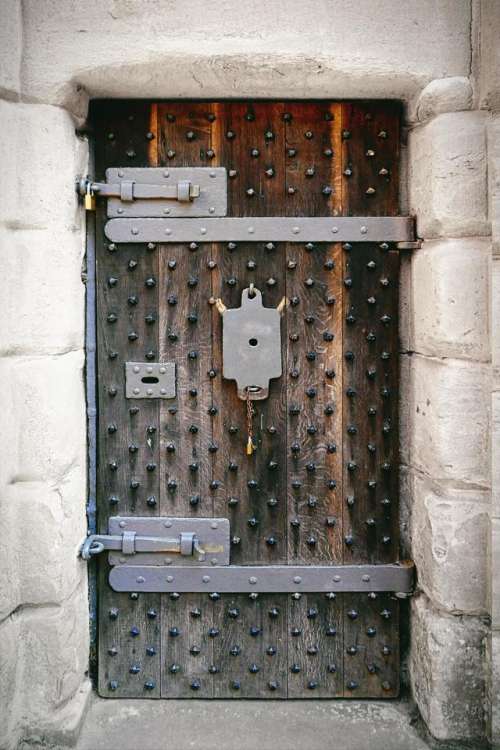 door studded iron dungeon lock