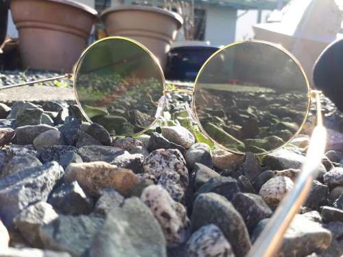 sunglasses sun rocks reflection