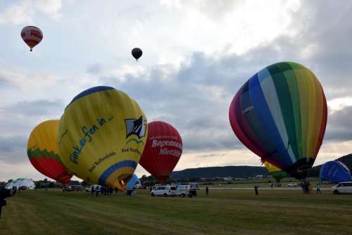 Hot air balloon preparation inflation start sky