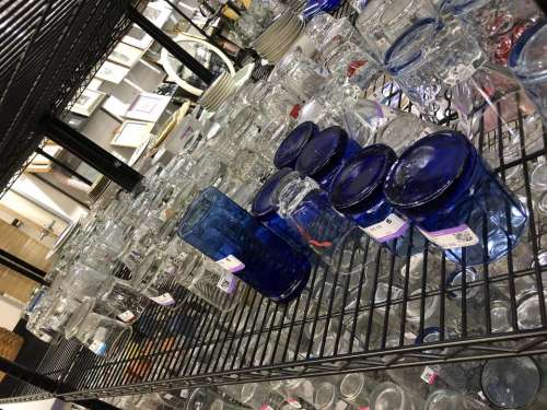 goodwill thrift store store shelf cups glassware