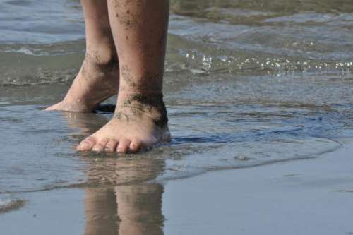 Feet beach seashore 