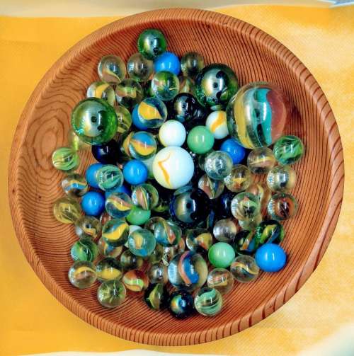 marbles bowl wooden colored glass