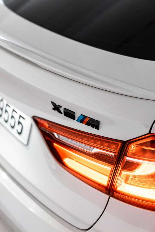 Black BMW X6M Rear Badge Logo Free Photo