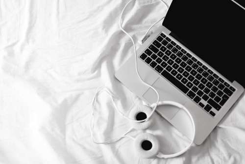 Listening Streaming Music in Bed Headphones Free Photo