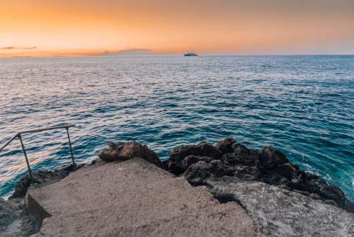 Morning Sea Horizon with a Boat Free Photo
