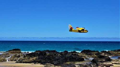 Light Aircraft Propeller Plane Ocean Sea Rock