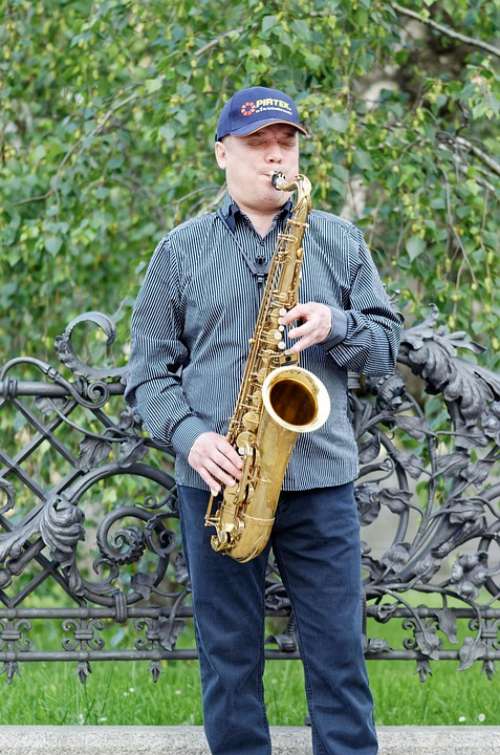 Man Adult Young Singing The Saxophone Interpreting