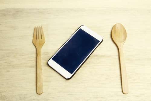 Smartphone Wooden Spoon Concept White Black Table