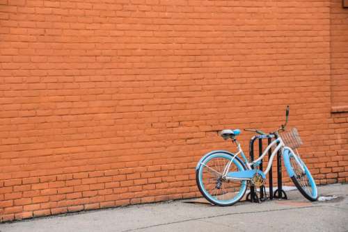 bike bicycle basket bricks wall
