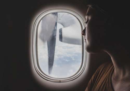 people woman airplane travel adventure