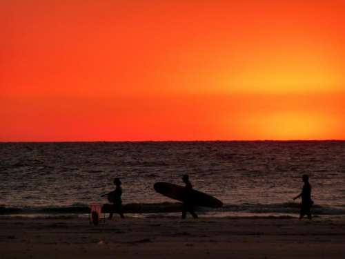 sunset red sky beach sand