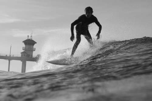 black and white guy man surfing sport