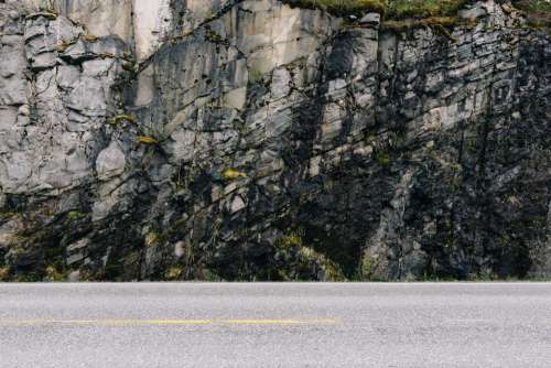 road pavement rocks cliff