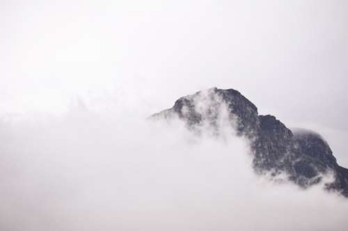 sky clouds fog mountains peaks