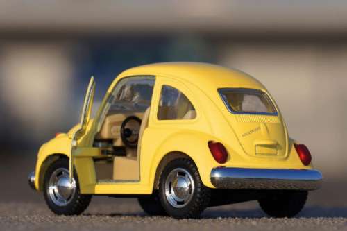 toy car miniature yellow volkswagen
