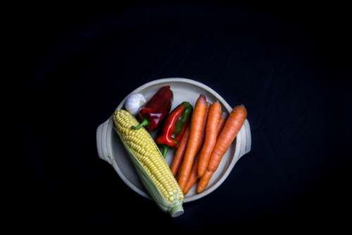 isolated vegetables plate carrots corn