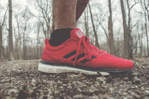 red sneakers running shoes footwear outdoor