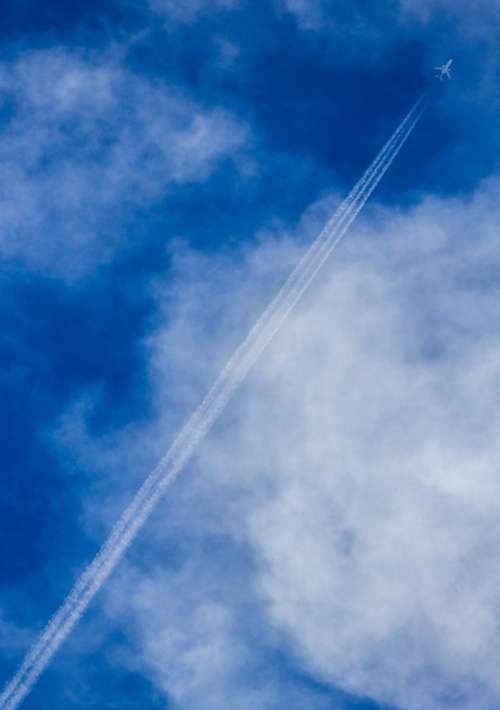 blue sky clouds airplane flying