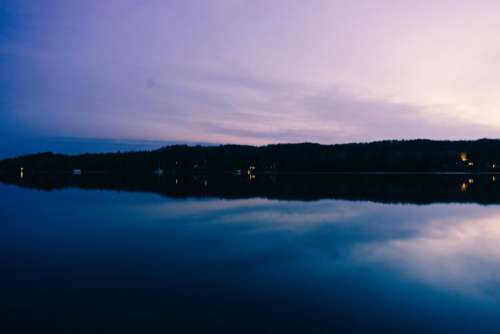 lake water reflection purple sky