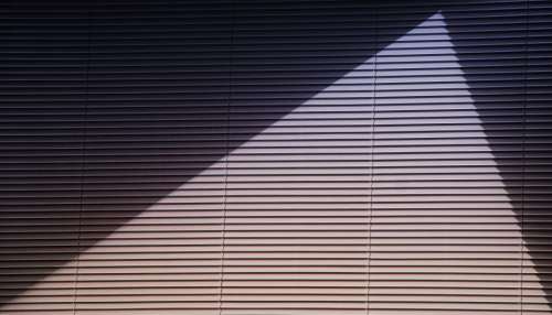shadow light blinds wall windows