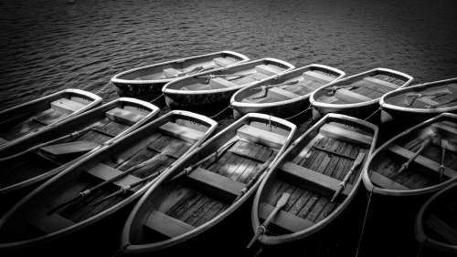 black and white monochrome boat paddle sailing
