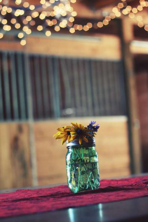 glass jar container water flowers