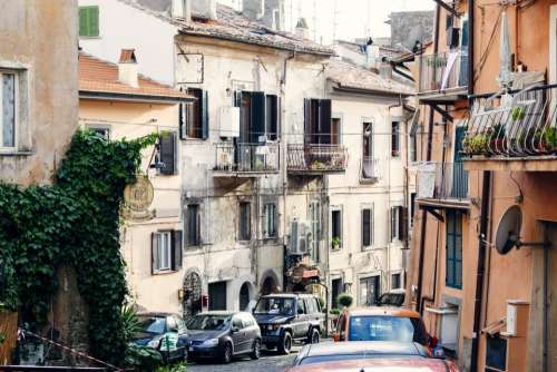 city town houses cars buildings