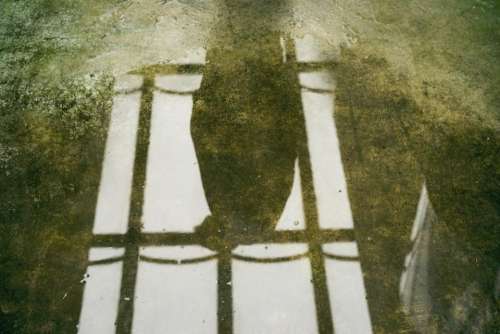 stone floor water puddle reflection