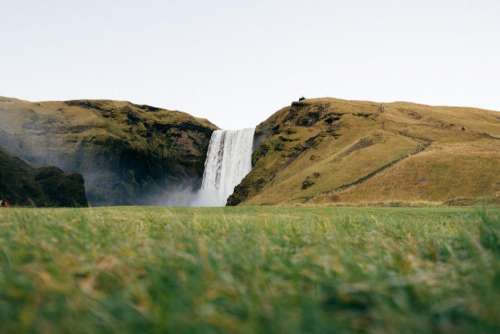 waterfall highland mountain green grass