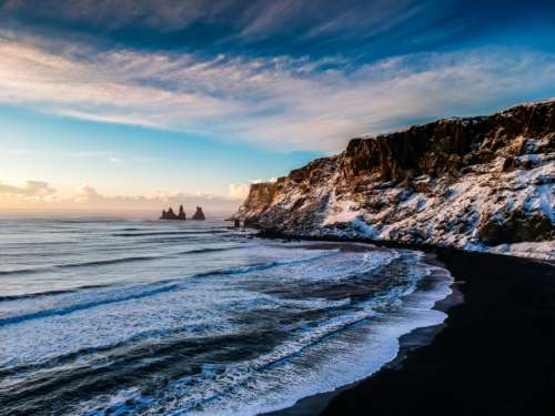 winter ocean cliffs snow cold