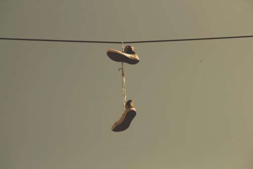 shoes laces power lines city sky