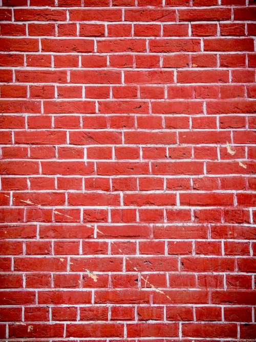 red wall bricks holes cracks