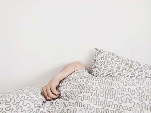 hand bed pillow sheet white