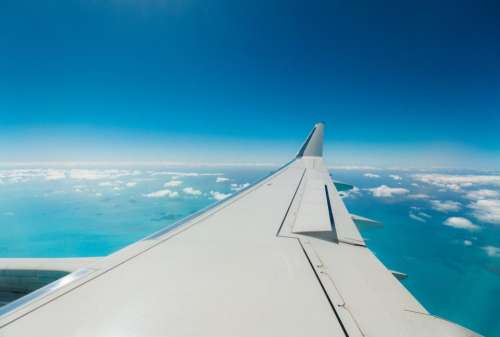 airplane airline travel trip blue