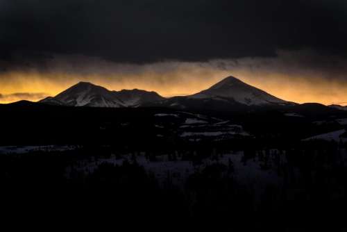 mountain highland dark clouds sky