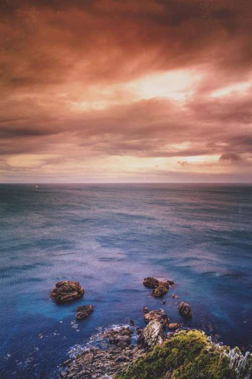 sunset sky clouds horizon ocean