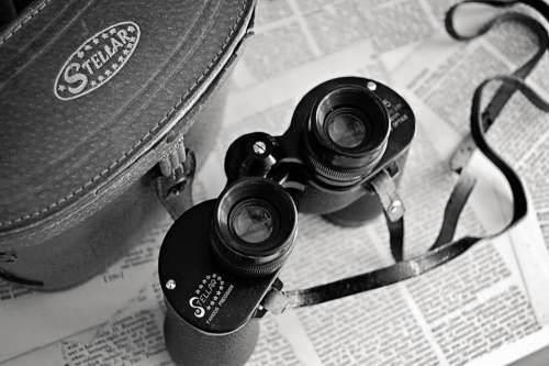 vintage binoculars newspaper view magnify